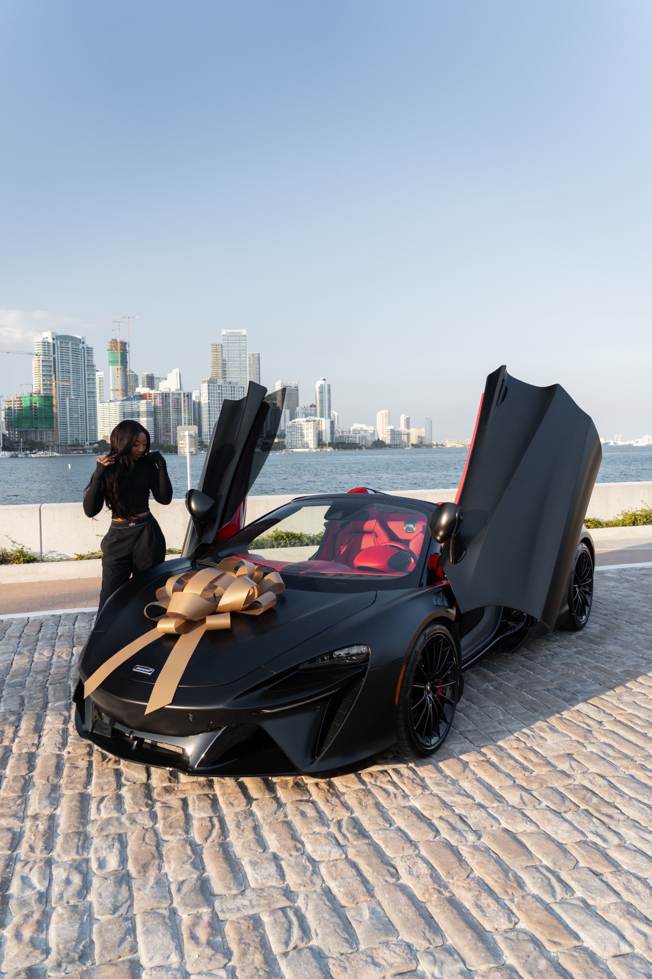 Monrae Hou with a McLaren in Miami